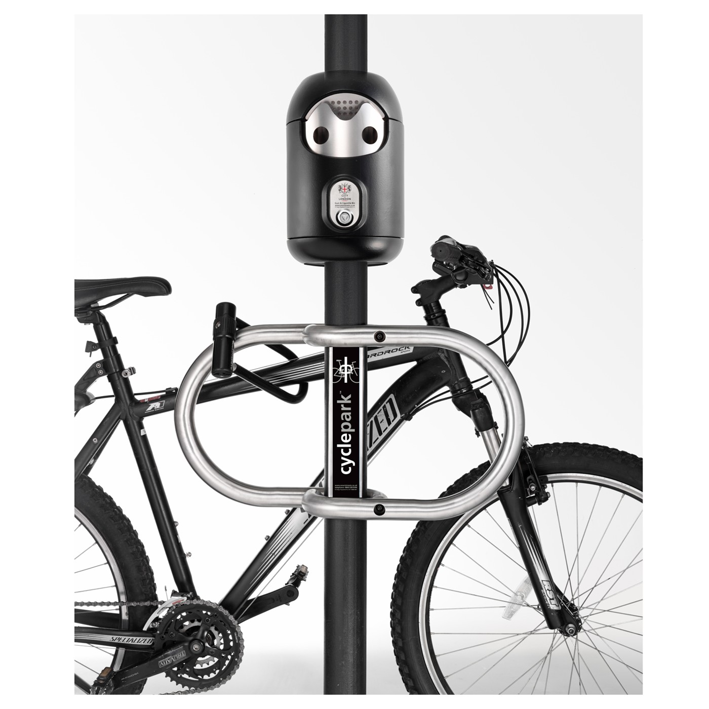 A Smartbin and silver Cyclepark sharing one post, with a bicycle secured alongside
