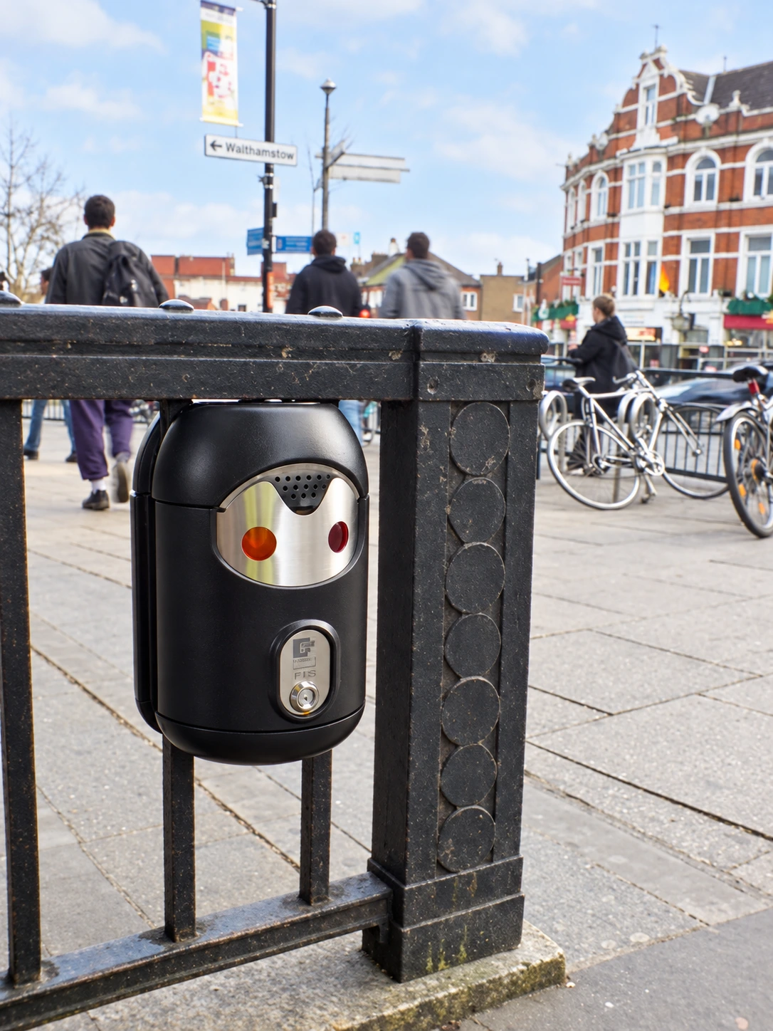Railing-mounted Smartbin cigarette and chewing gum bins