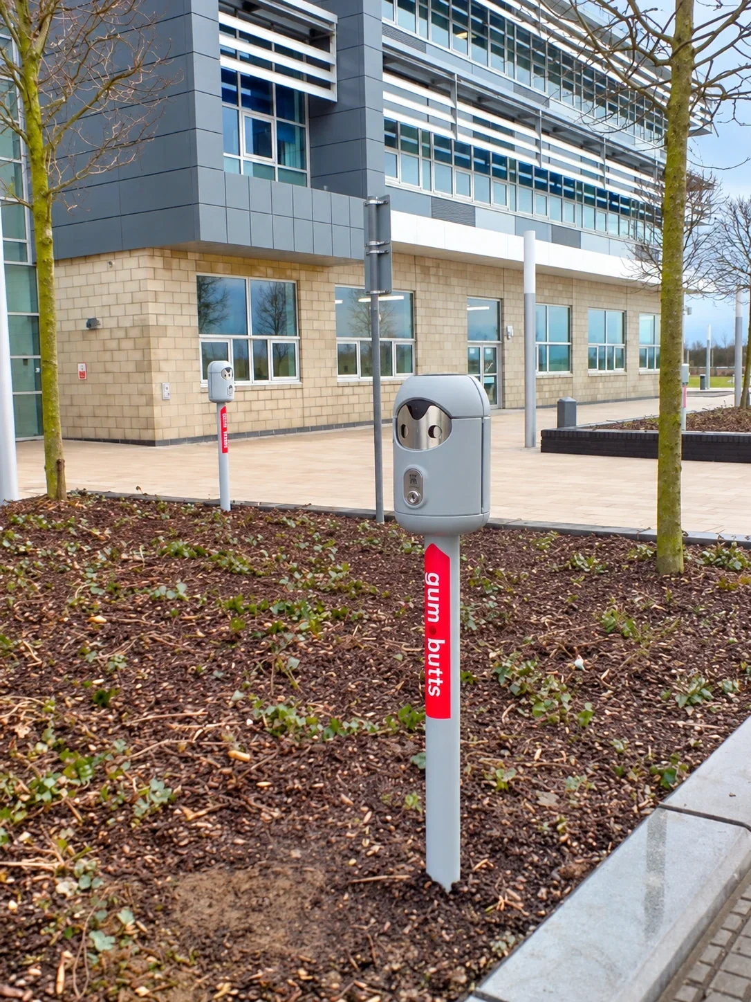 Freestanding Smartbin cigarette and chewing gum bins