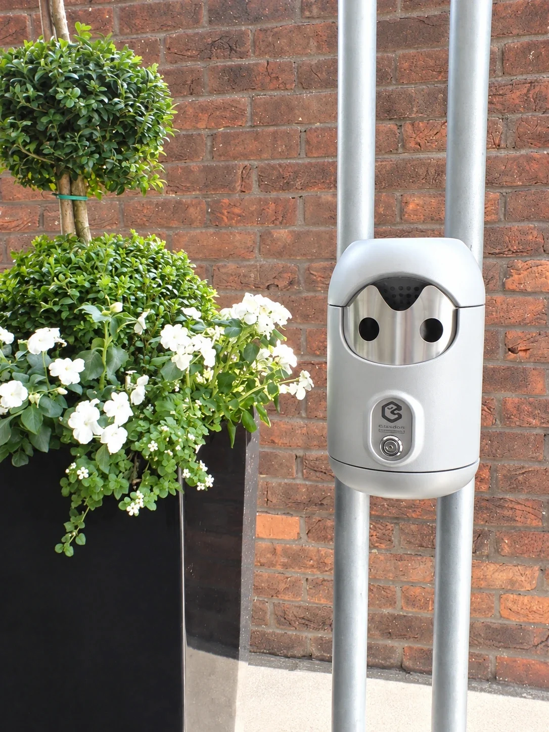 Railing-mounted Smartbin cigarette and chewing gum bins