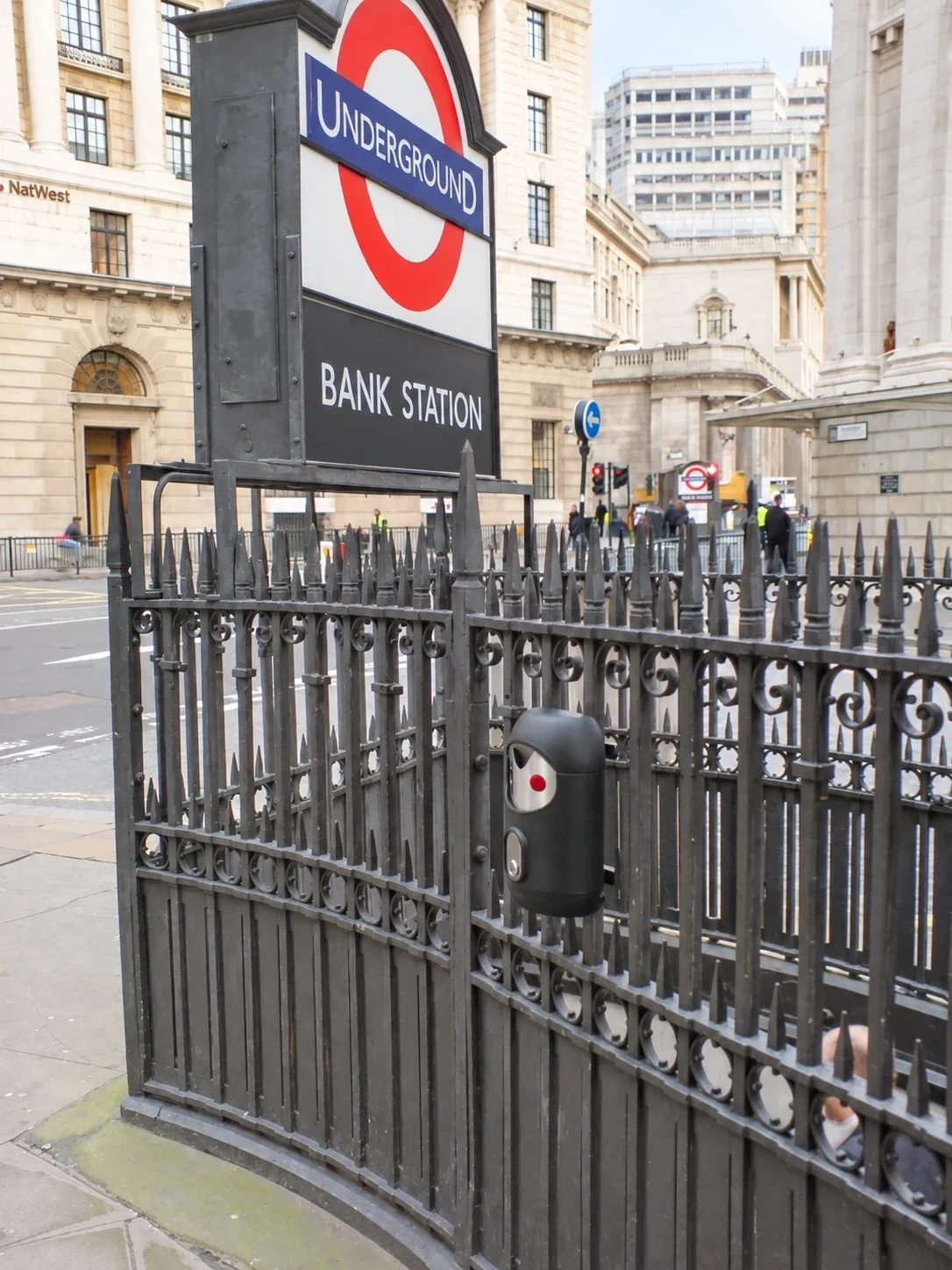 Railing-mounted Smartbin cigarette and chewing gum bins