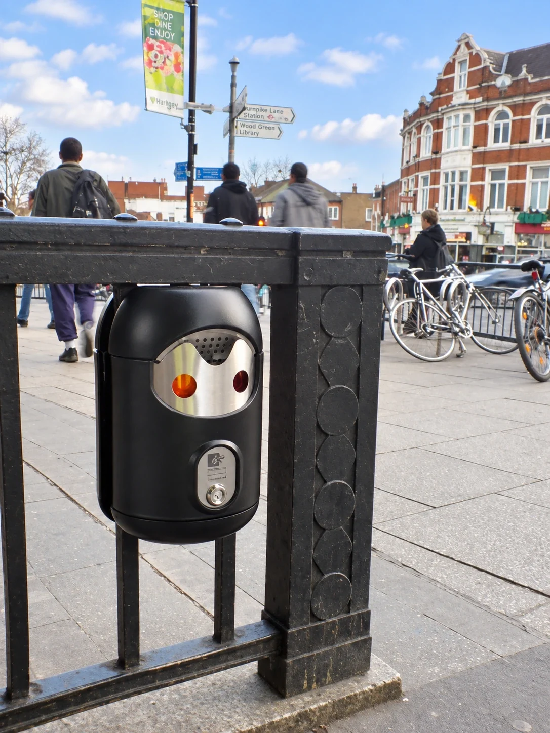 Railing-mounted Smartbin cigarette and chewing gum bins