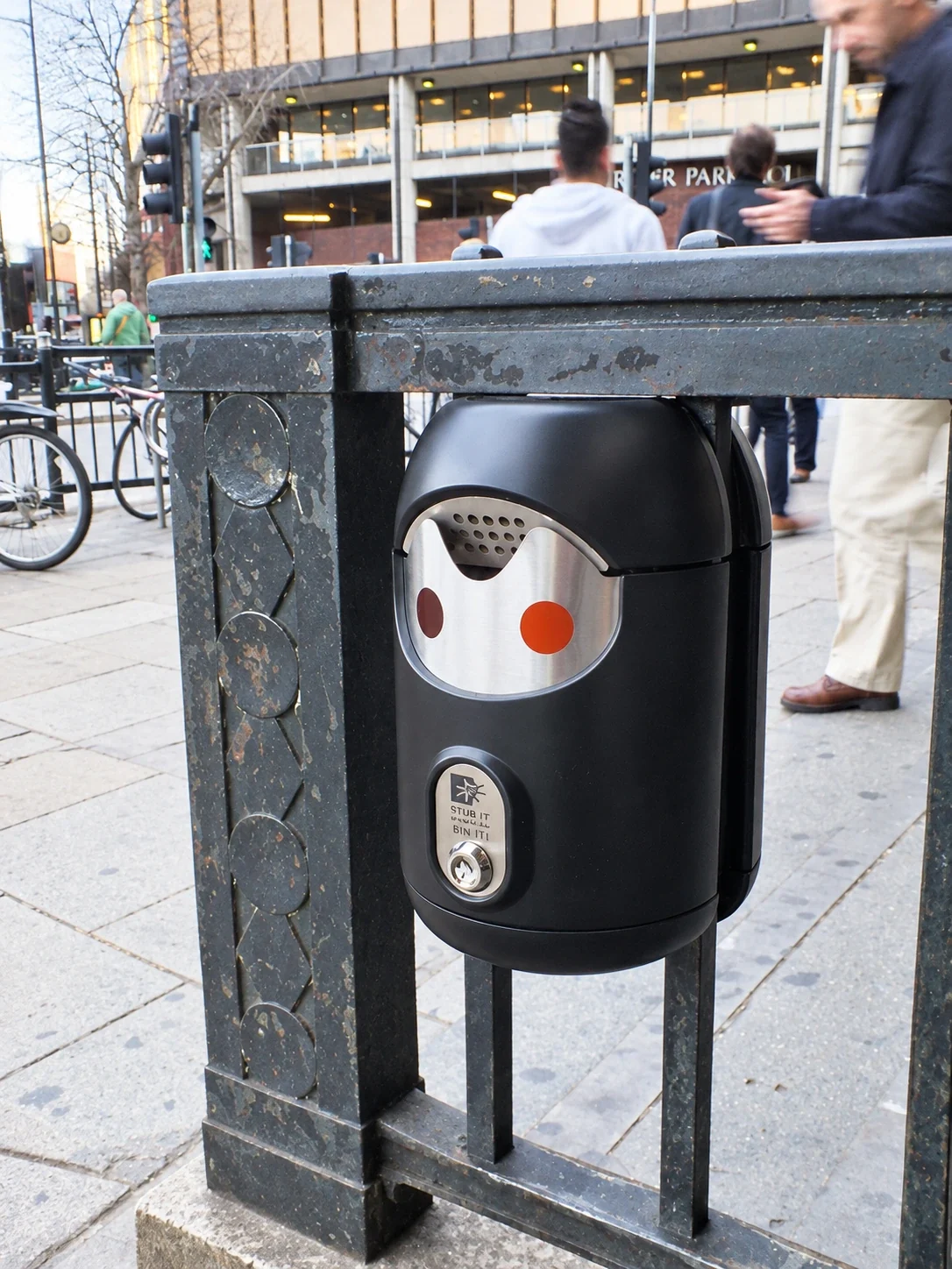 Railing-mounted Smartbin cigarette and chewing gum bins