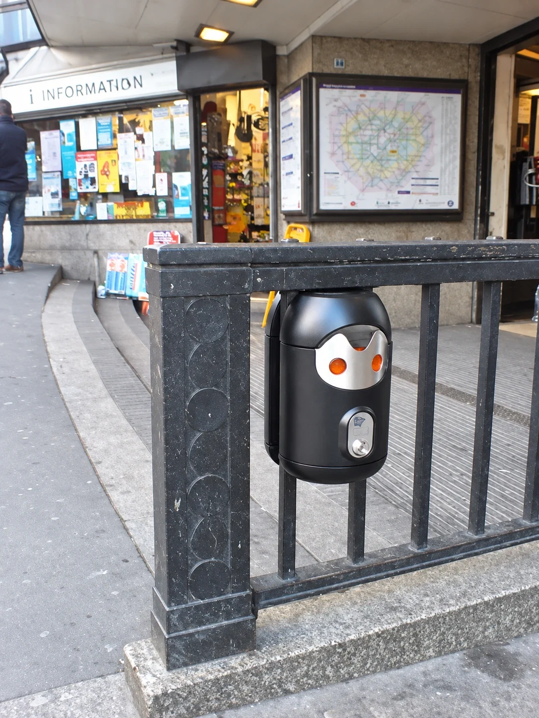 Railing-mounted Smartbin cigarette and chewing gum bins