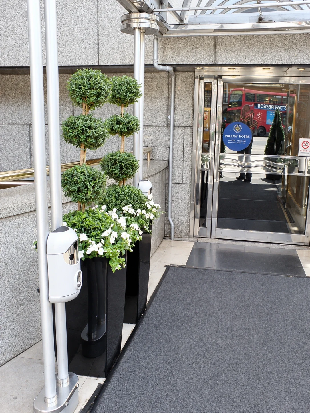 Railing-mounted Smartbin cigarette and chewing gum bins