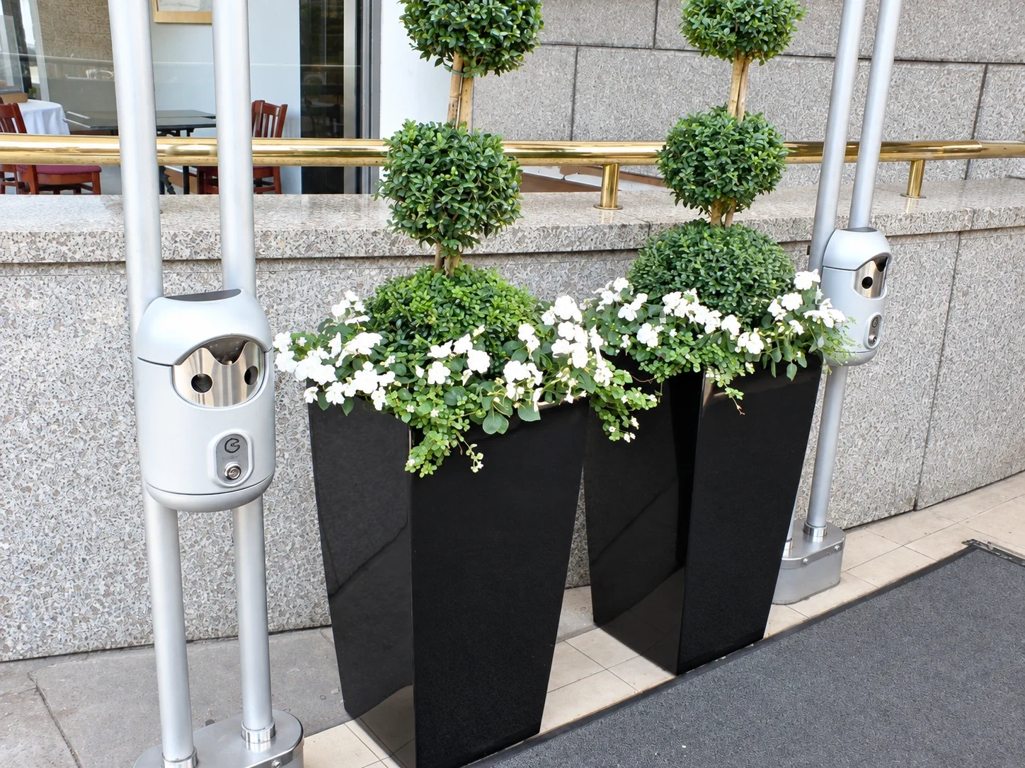 Railing-mounted Smartbin cigarette and chewing gum bins