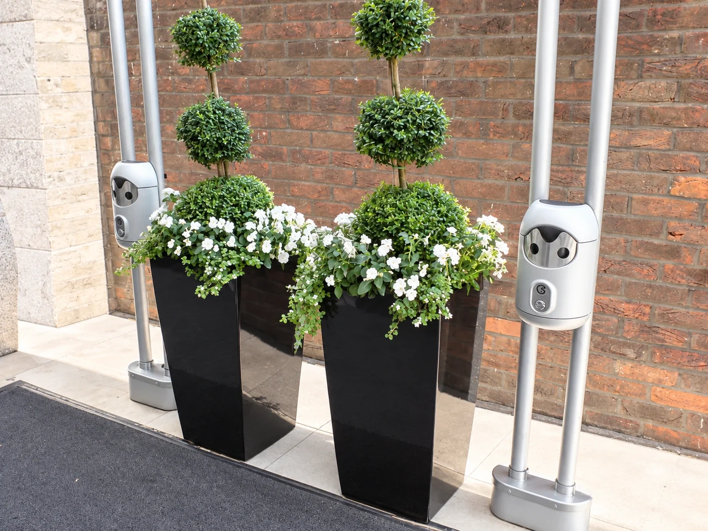 Railing-mounted Smartbin cigarette and chewing gum bins