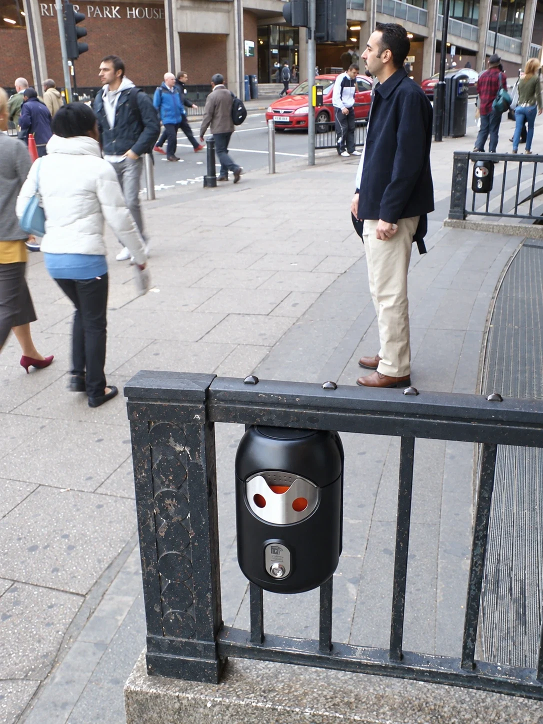 Railing-mounted Smartbin cigarette and chewing gum bins