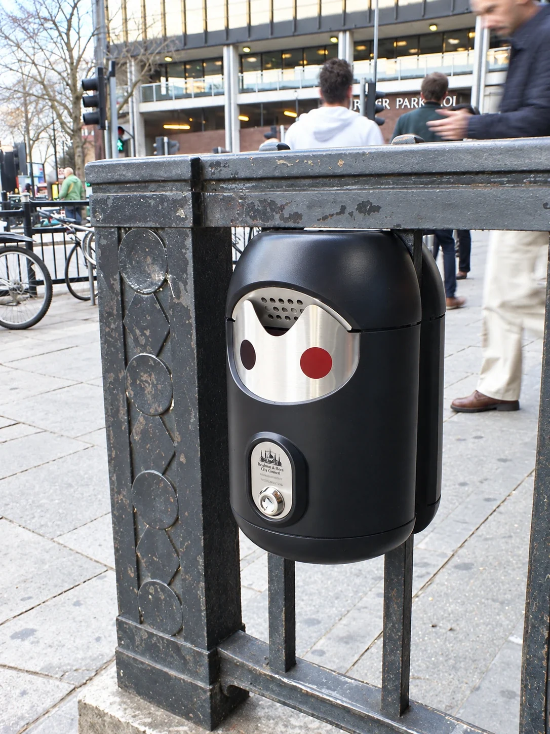 Railing-mounted Smartbin cigarette and chewing gum bins
