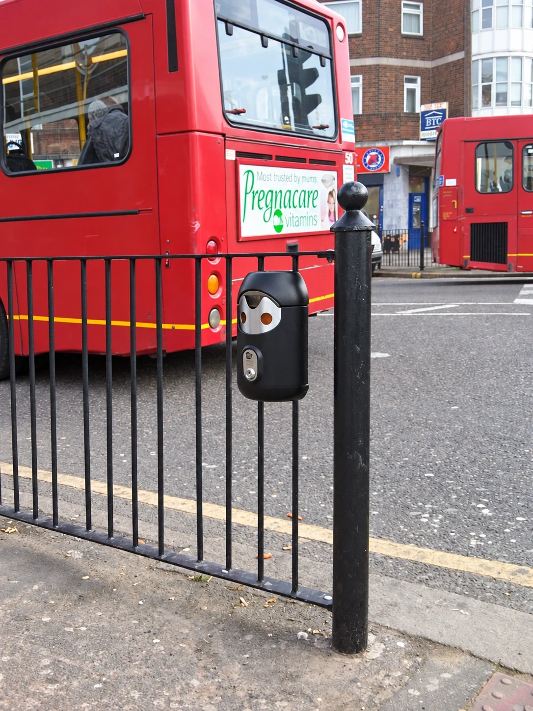 Railing-mounted Smartbin cigarette and chewing gum bins
