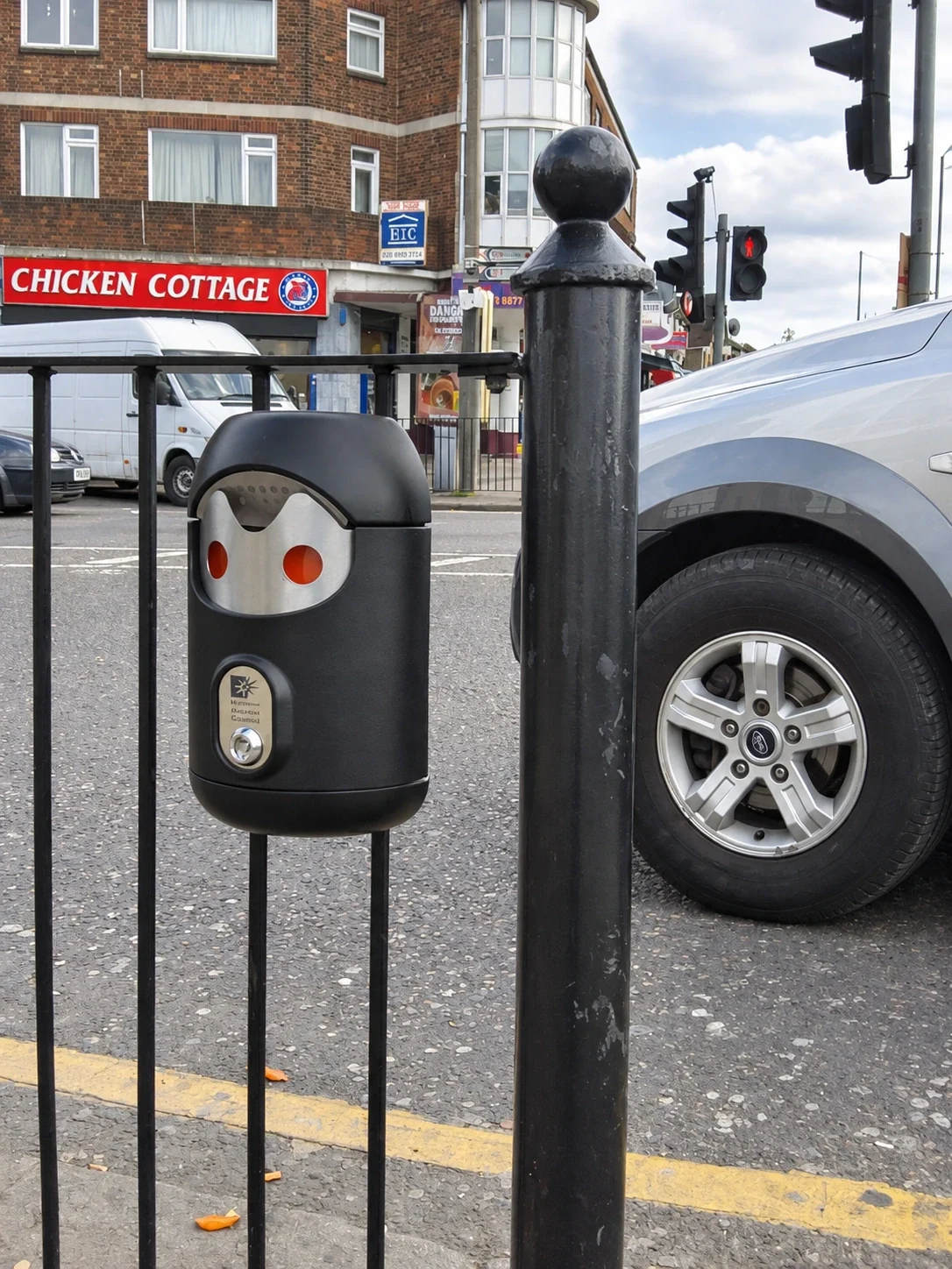 Railing-mounted Smartbin cigarette and chewing gum bins