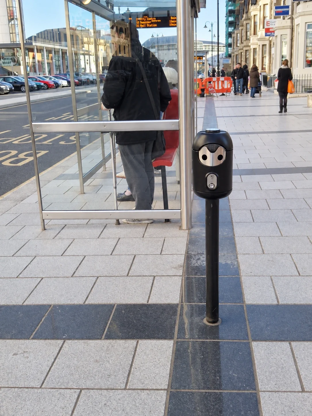 Freestanding Smartbin cigarette and chewing gum bins