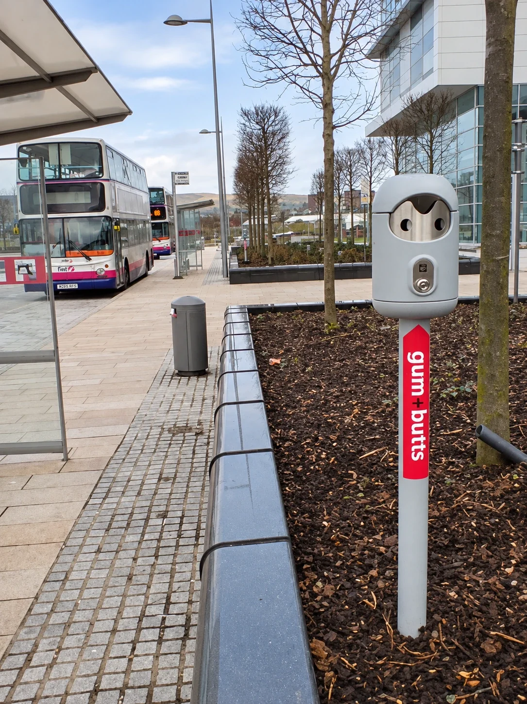 Freestanding Smartbin cigarette and chewing gum bins