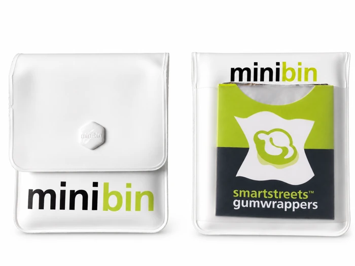 Green and black Smartstreets Gumwrapper sleeve shown with Minibin pocket ashtrays
