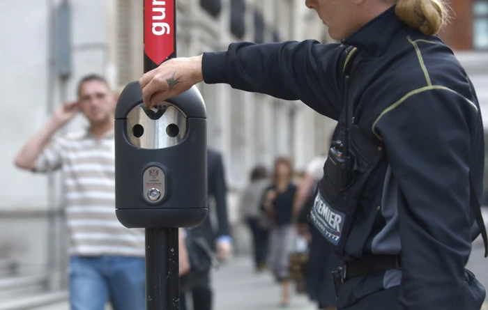A courier using a Smartbin